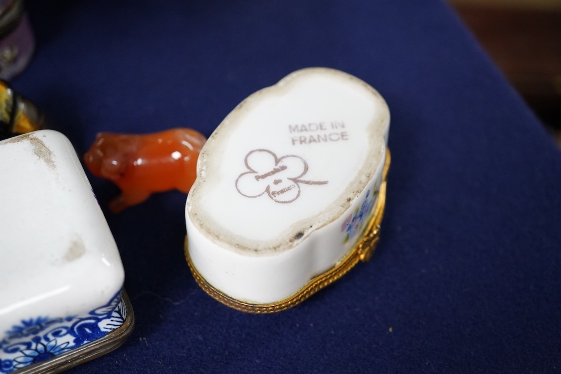 A collection of various 18th century and later trinket/pill boxes, a micro mosaic frame and two small carvings to include a tiger’s eye Scottie dog, frame 10cm in diameter